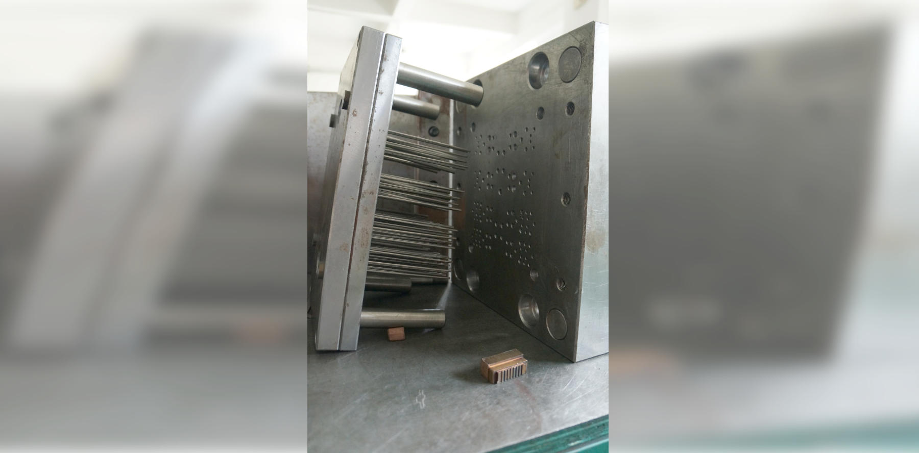 Ejectors from another mold, clearly visible