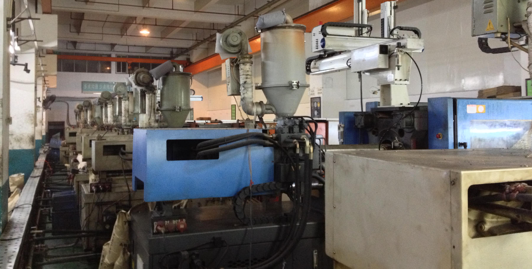 Rows of injection molding machines